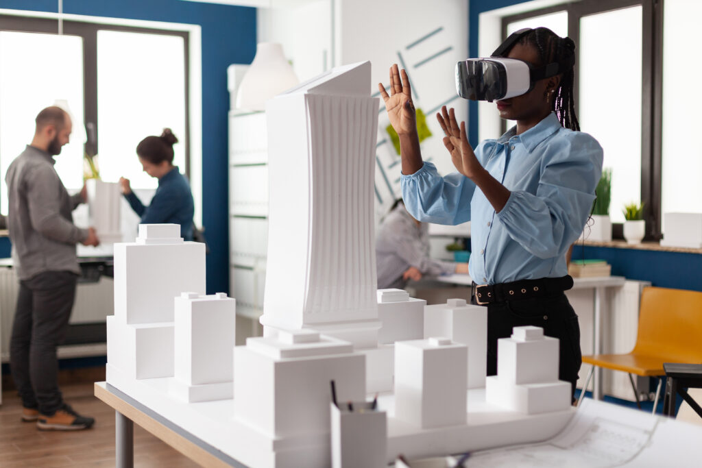 african american woman using vr glasses work